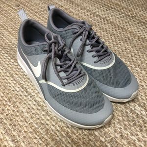 Gray and White Nike Air Max Thea
